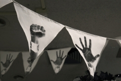 The Pacific Electric Railway Strike of 1903 (detail of pennants), silkscreen on cloth, 2018
